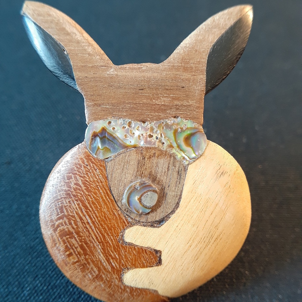Handcrafted wood with inlaid abalone kangaroo pin